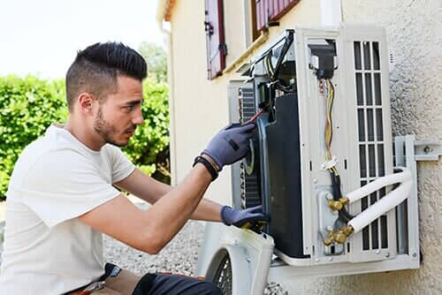 Electrician Repairing Air Conditioning - HVAC Repair Service in Wroth, IL