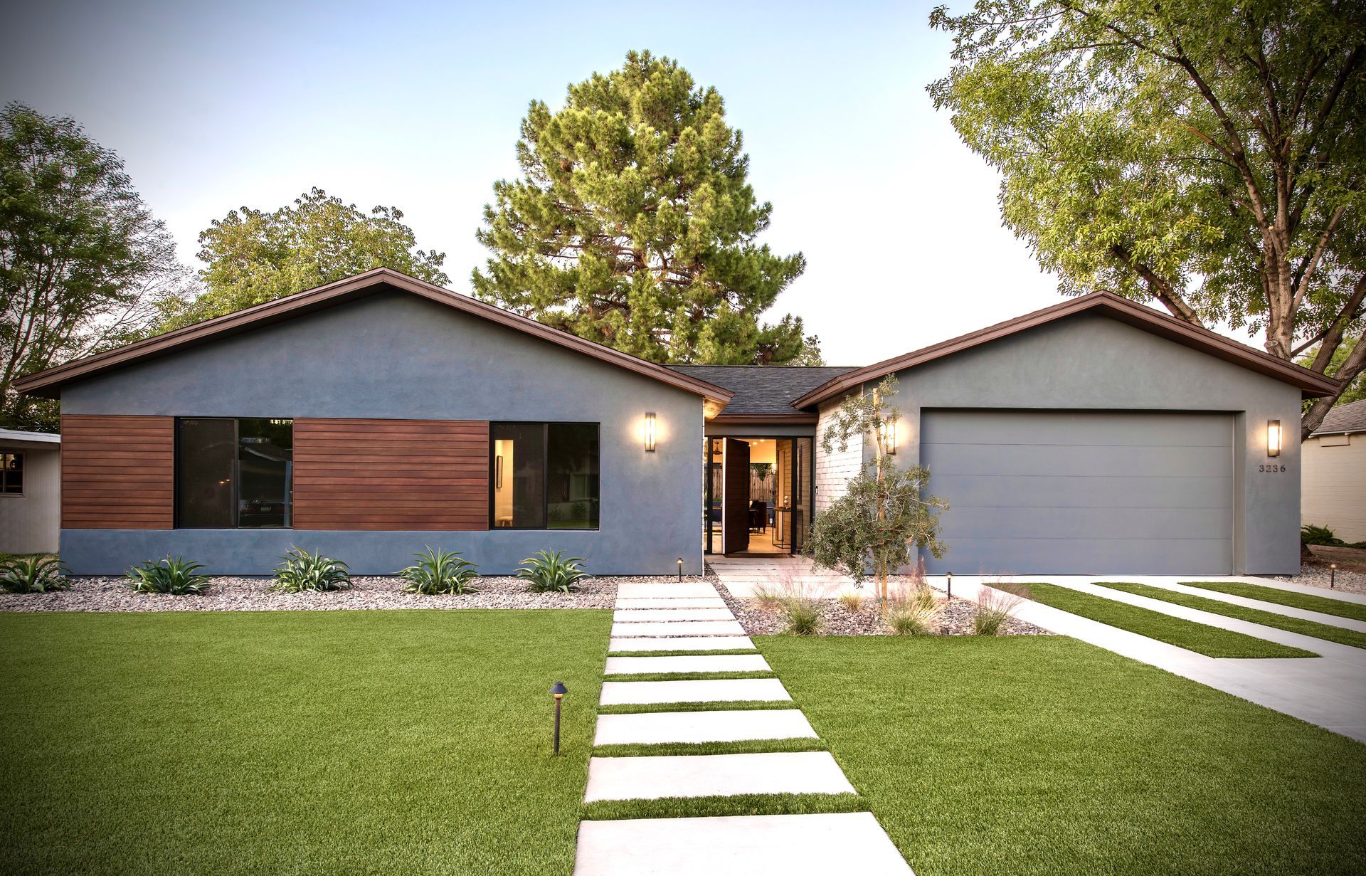 The front of a house with a walkway leading to it