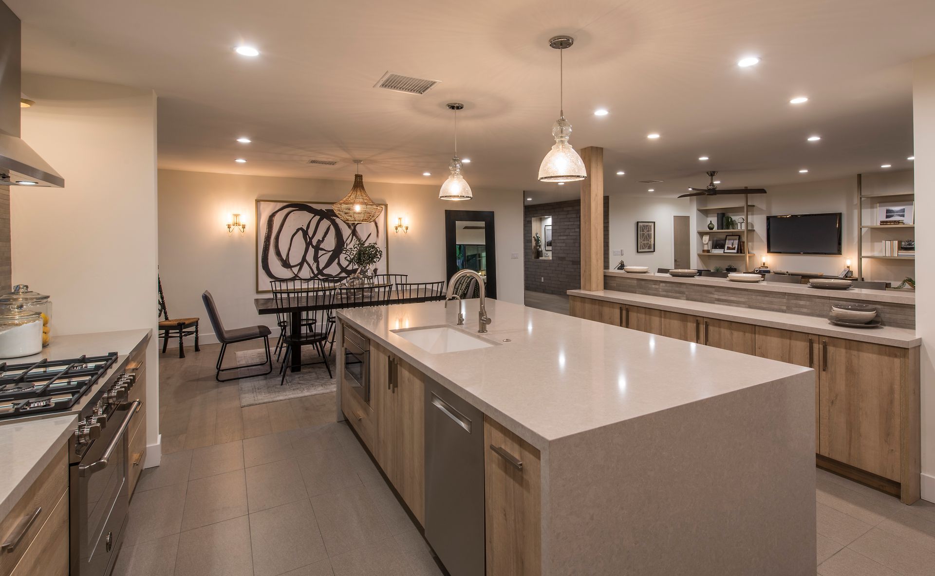 There is a large island in the middle of the kitchen.