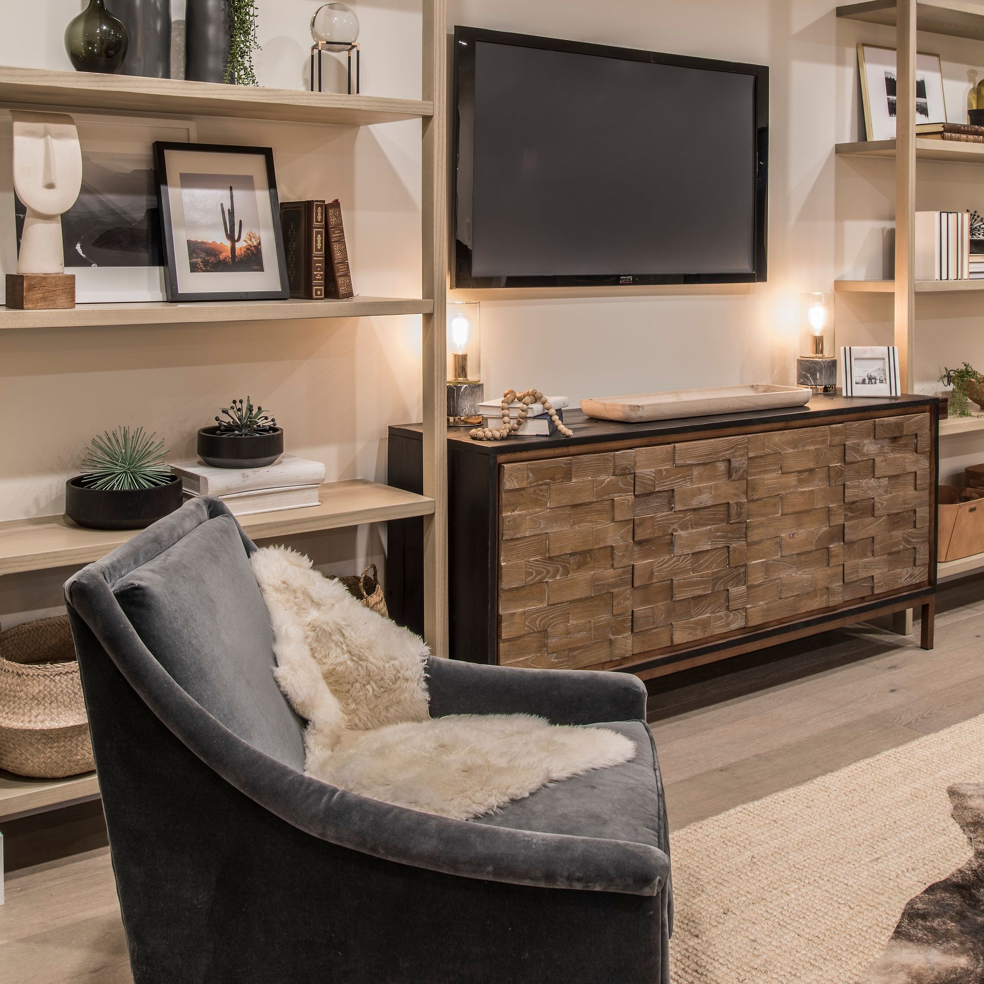 A living room with a chair and a flat screen tv