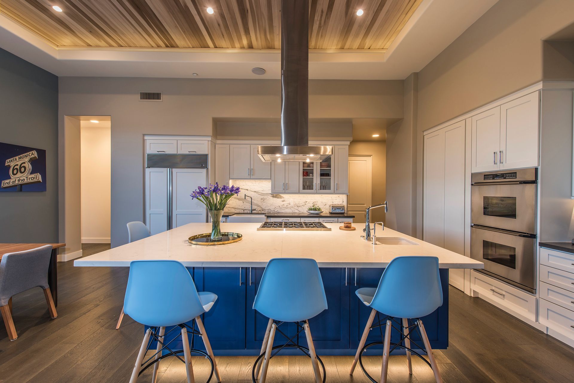 There is a large island in the middle of the kitchen.