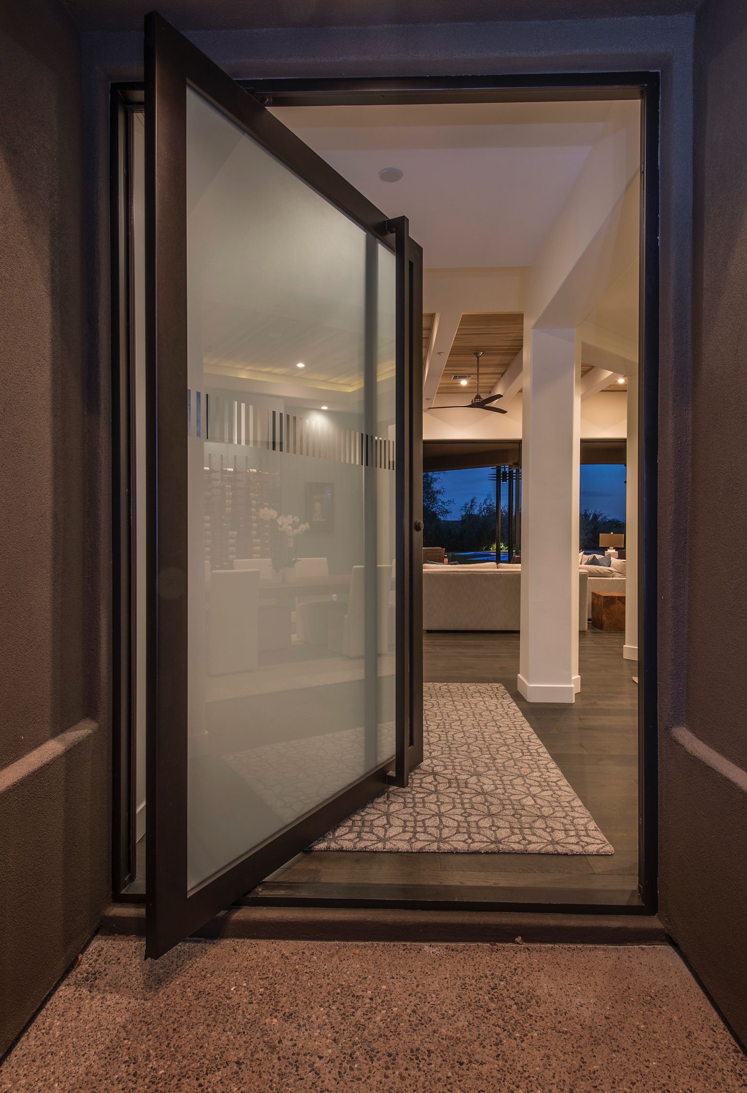 The door is open and looking into the living room.