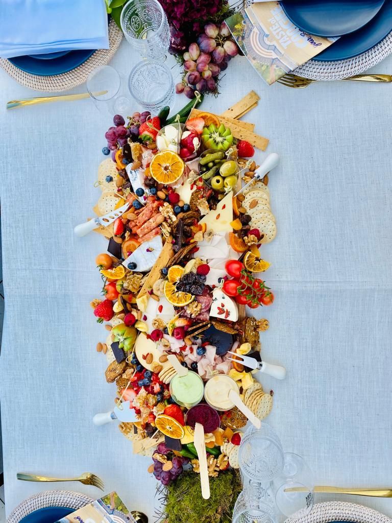 Curated grazing board with premium meats, cheeses, and fresh produce, styled for intimate and elegant events.