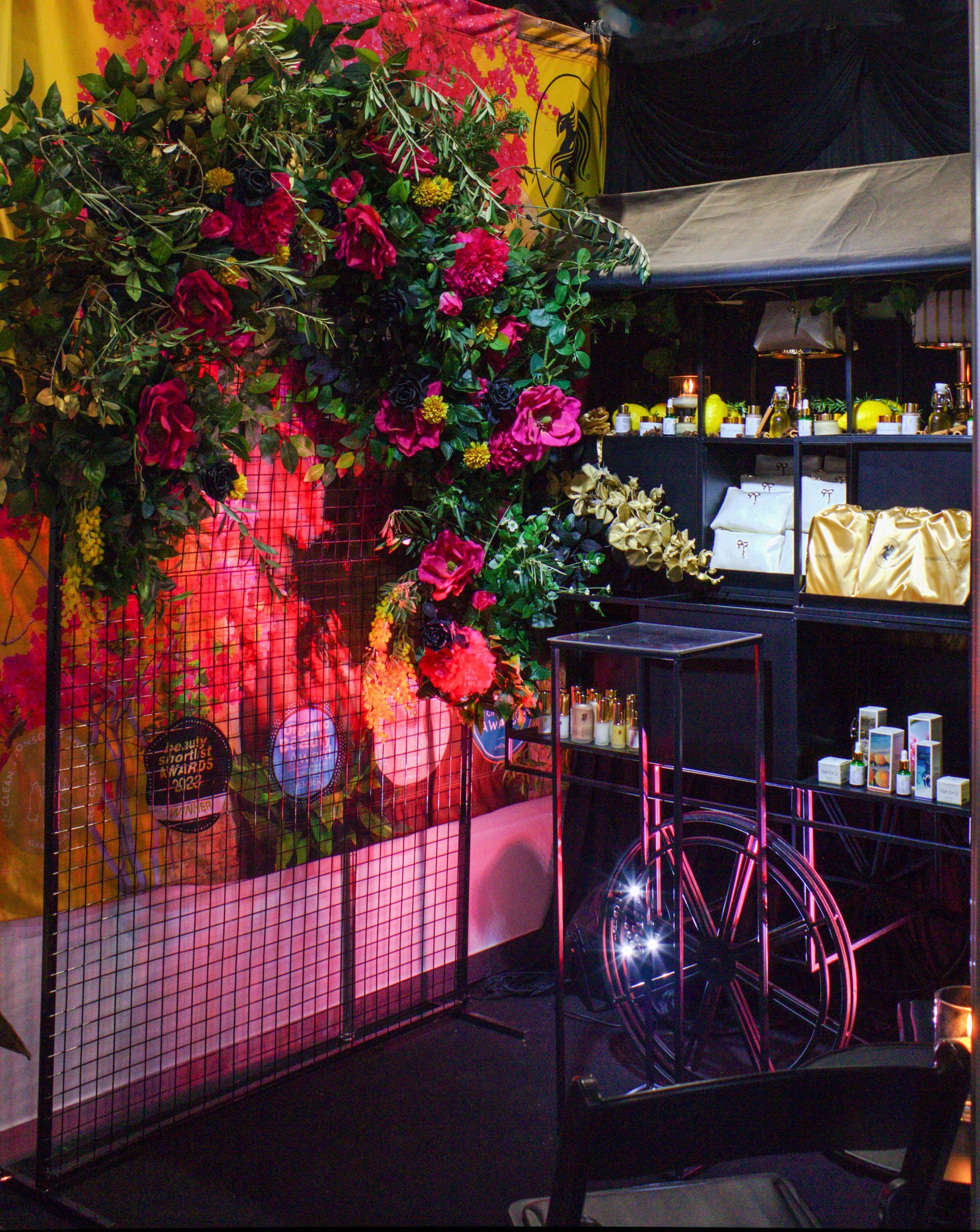 Luxury skincare product display surrounded by natural ingredients