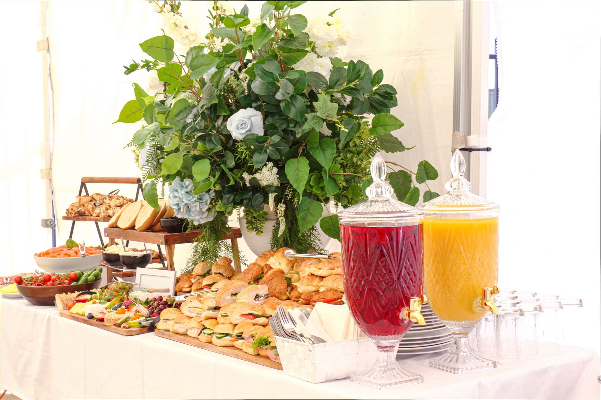 Luxurious grazing station styled with gourmet cheeses, fruits, and florals designed for premium event experiences.