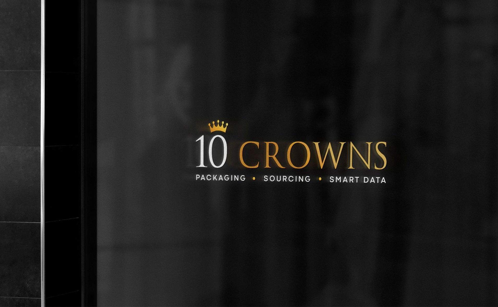 a glass window with the 10 crowns logo design
