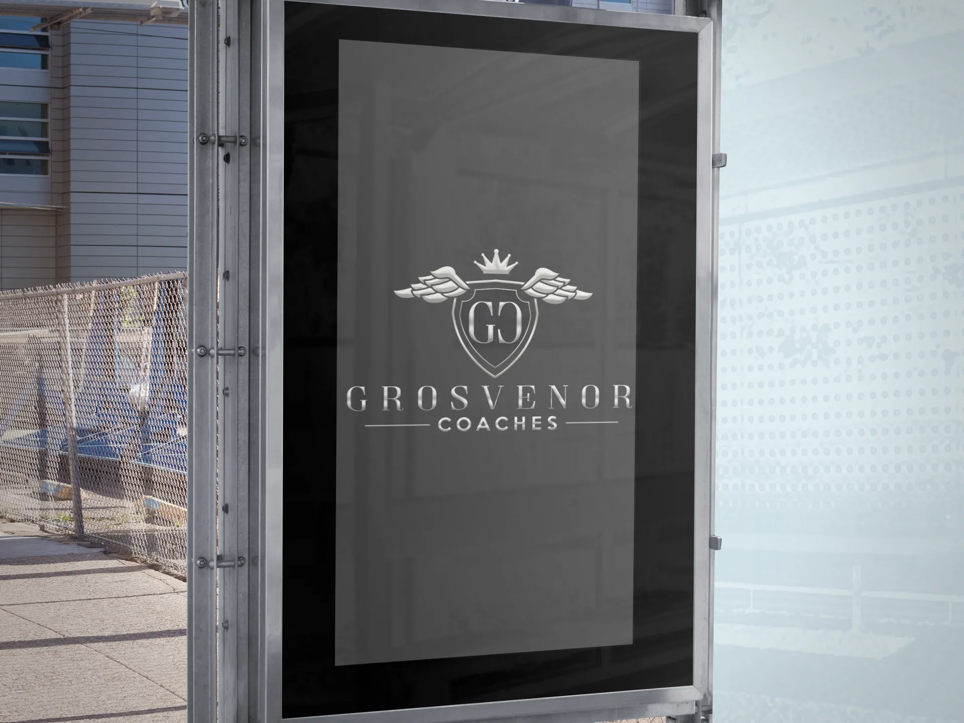 A sign that displays the grosvenor Coaches Logo
