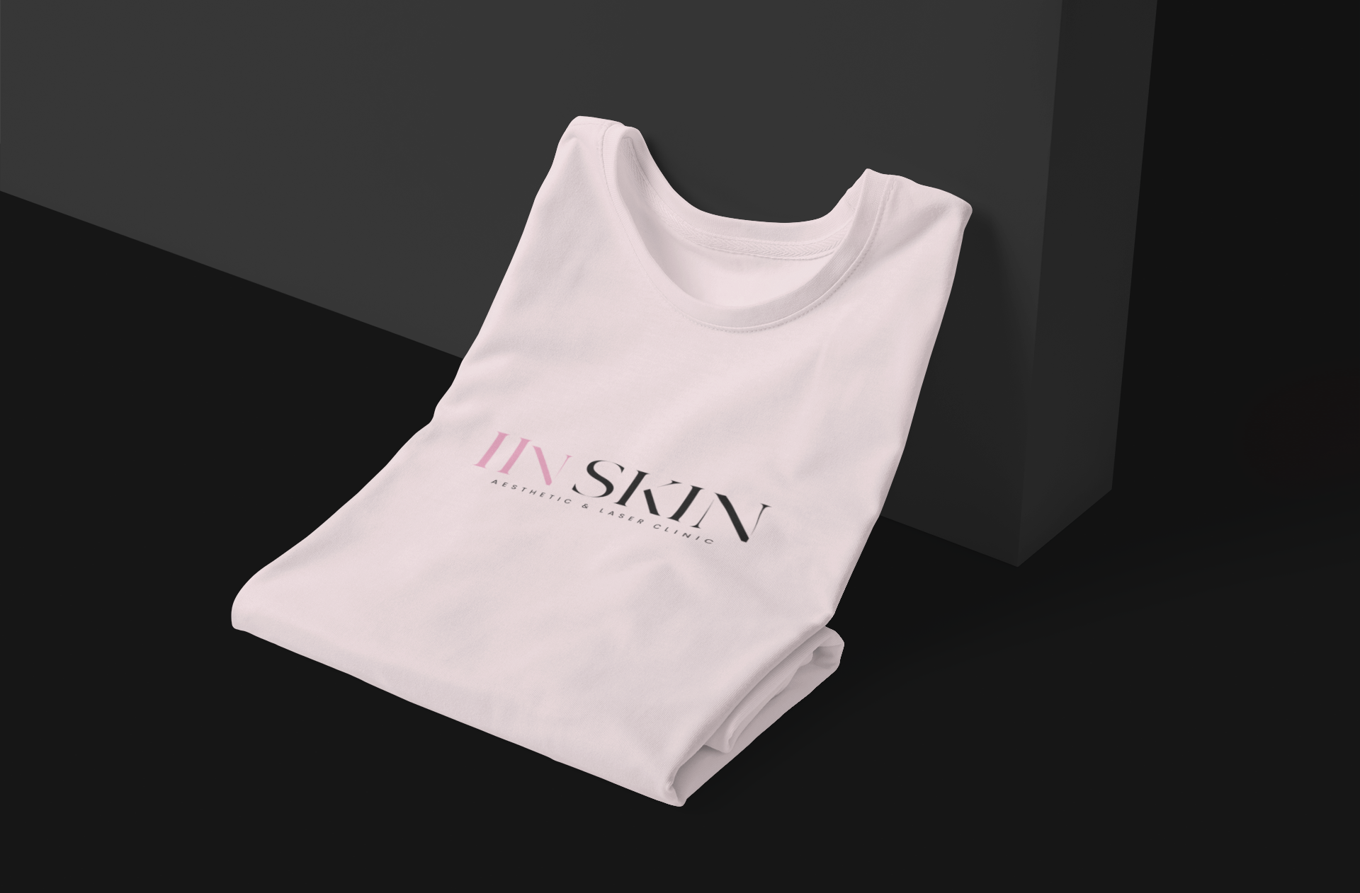 a pink iinSkin Clinic t-shirt