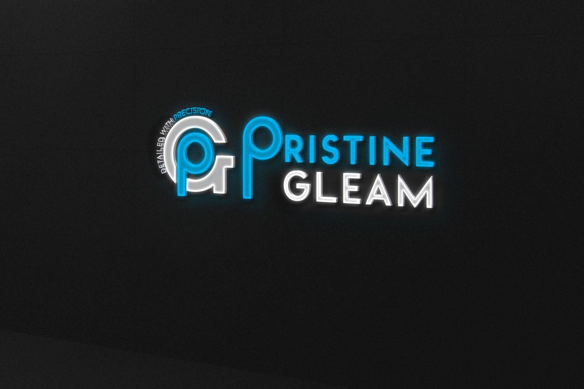 A logo of Pristine Gleam on a black background