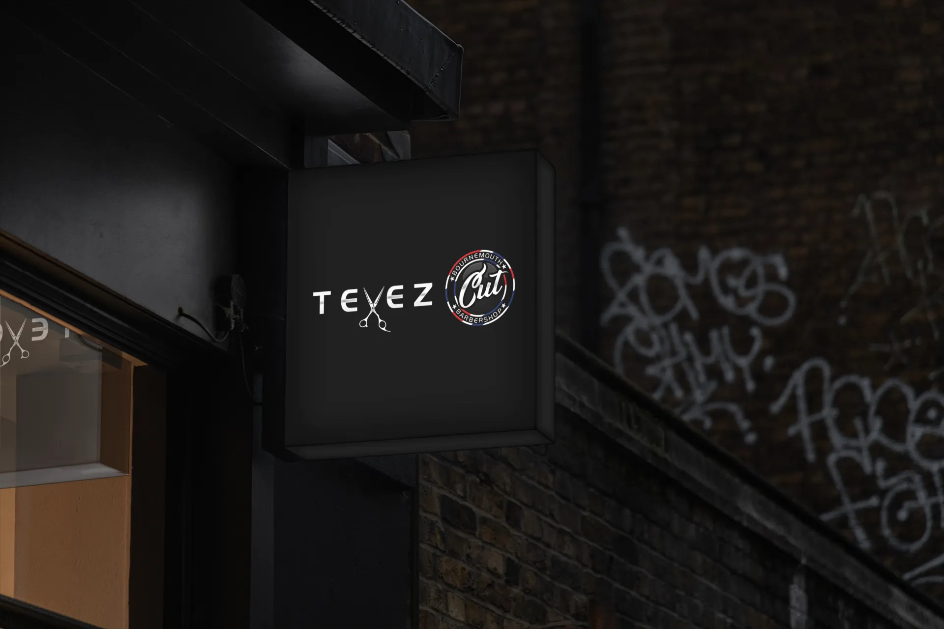 Side shop signn displaying the Tevez Cut Barbery Shop Logo Design