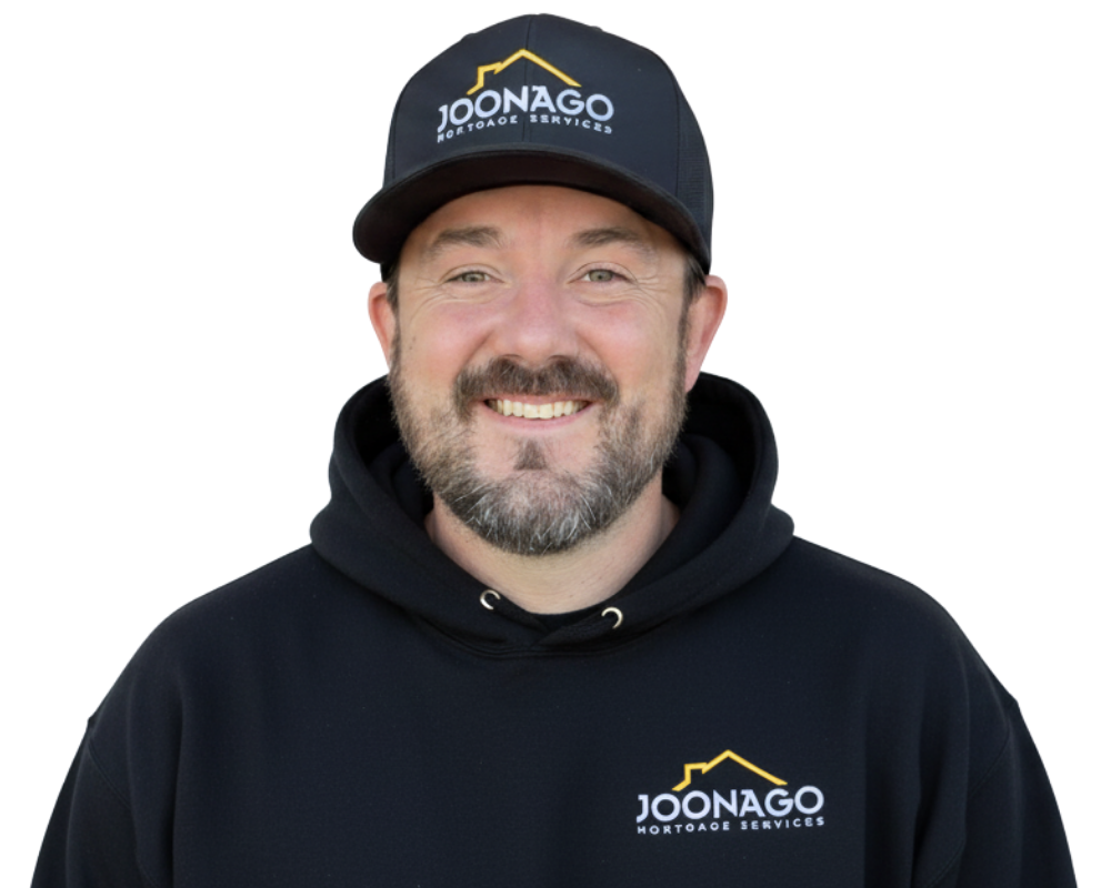 joe huljak from joonago mortgage in a suit and tie smiles for the camera