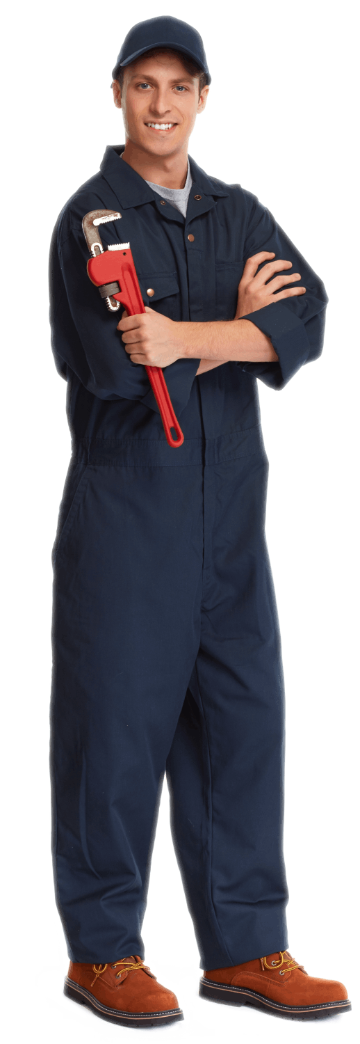 A man in a blue jumpsuit is holding a wrench.