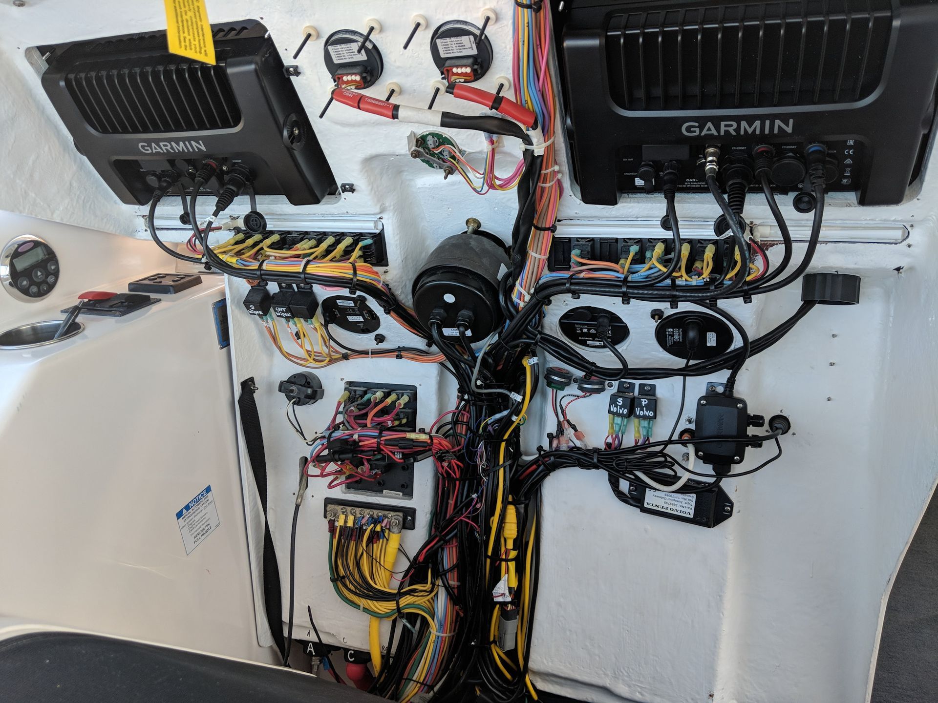 Marine electronics wiring and helm installation in progress