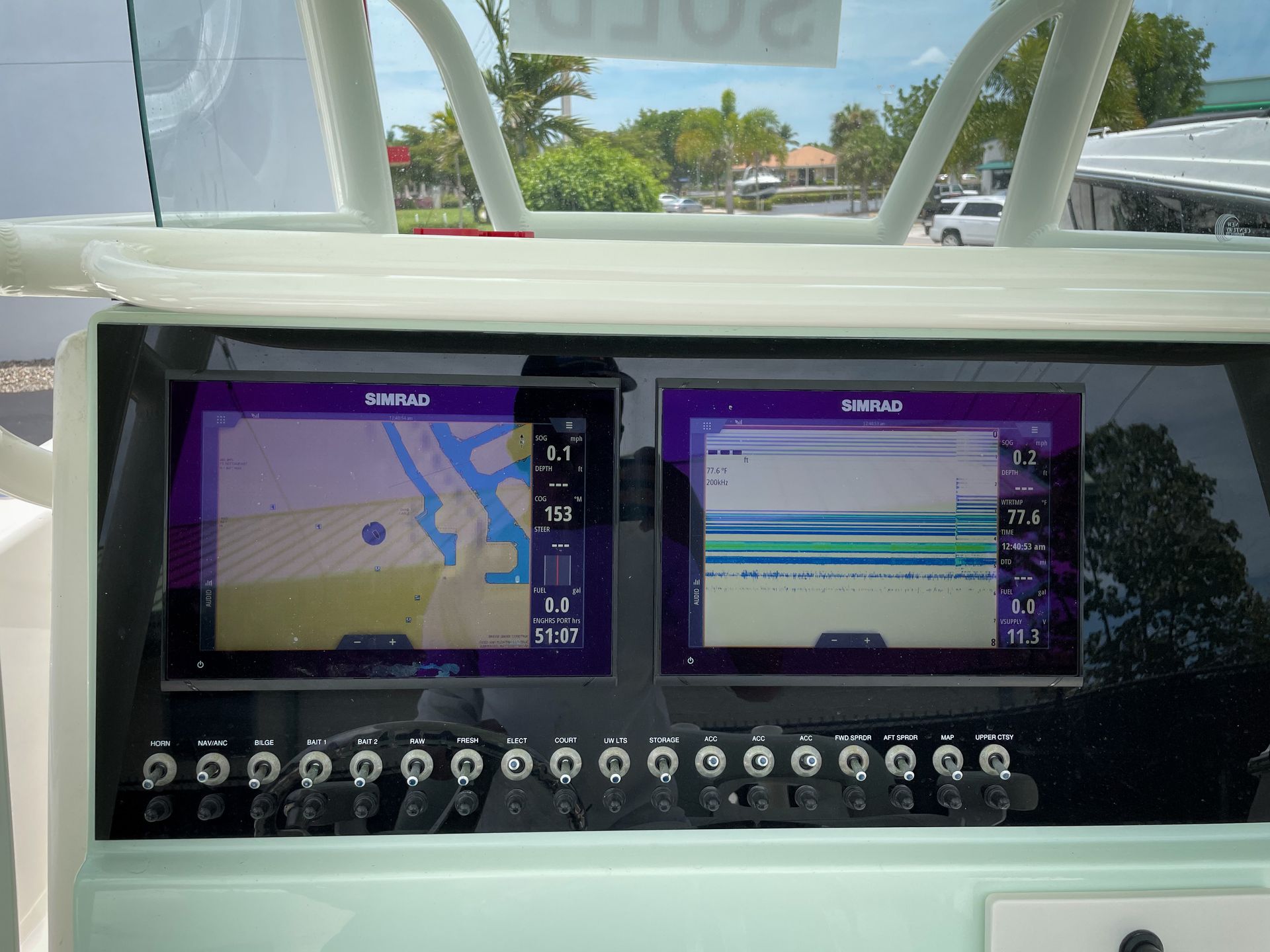 Marine GPS and chartplotter electronics installation at boat helm