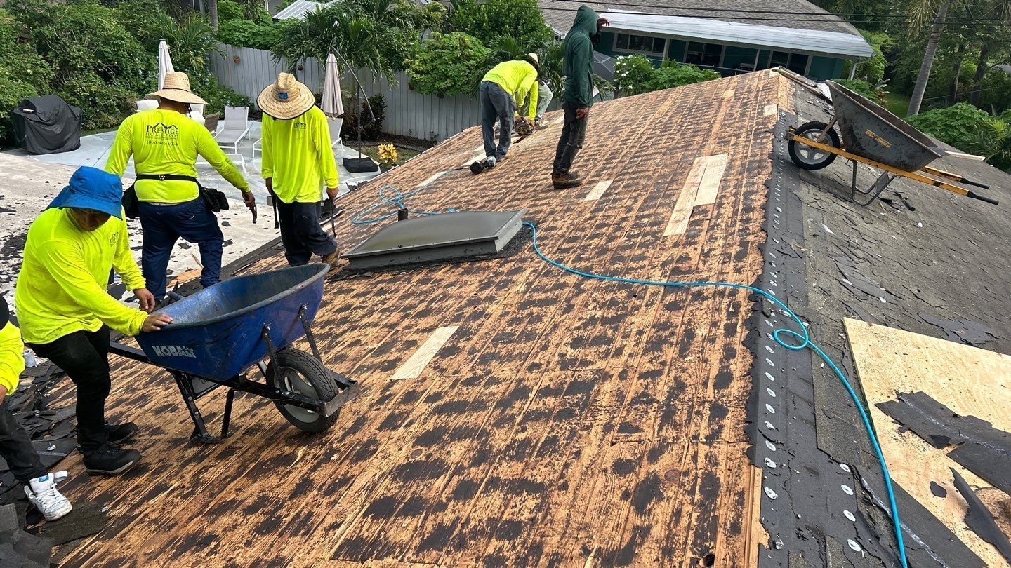 Roof tear off process for replacement by Prestige Windows & Doors