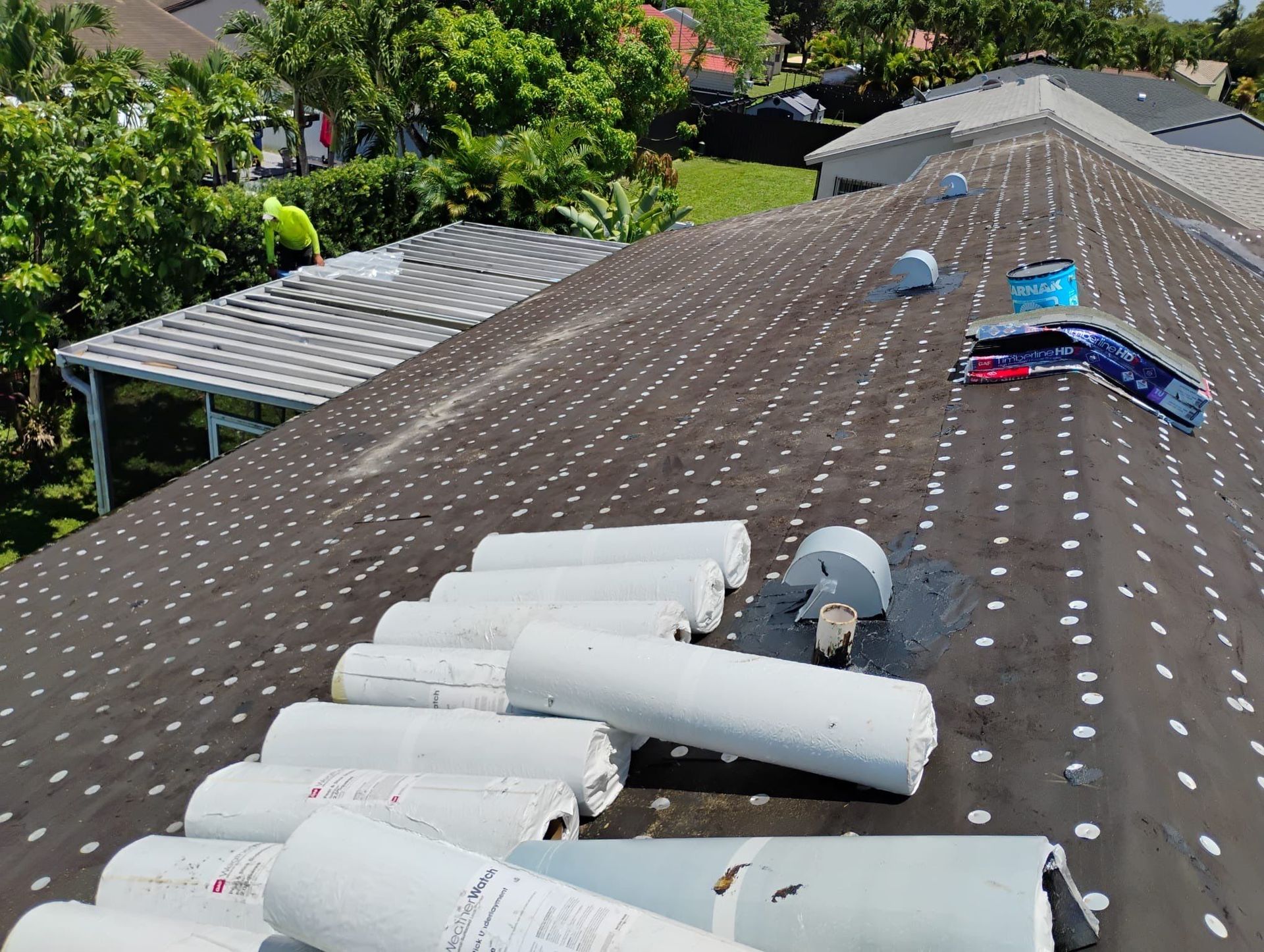 Roofing materials prepared for installation by Prestige Windows & Doors