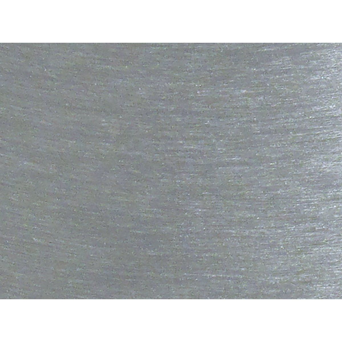 A close up of a piece of stainless steel on a white background.
