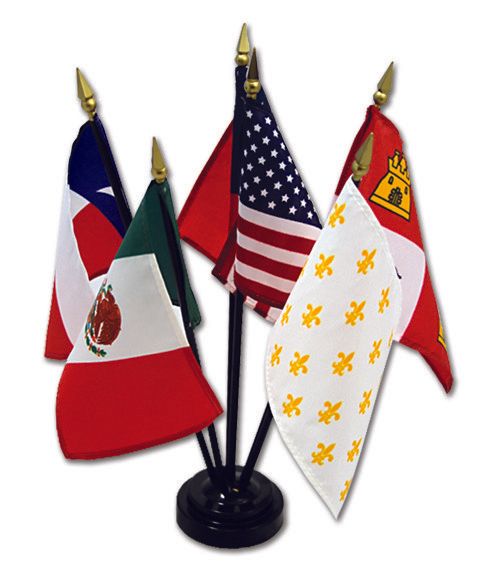 A bunch of small flags are on a stand