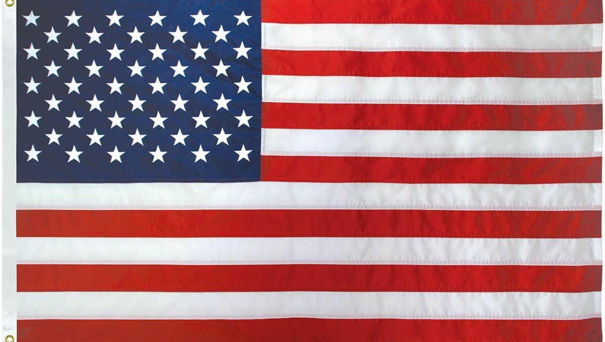 A red white and blue american flag with stars on it