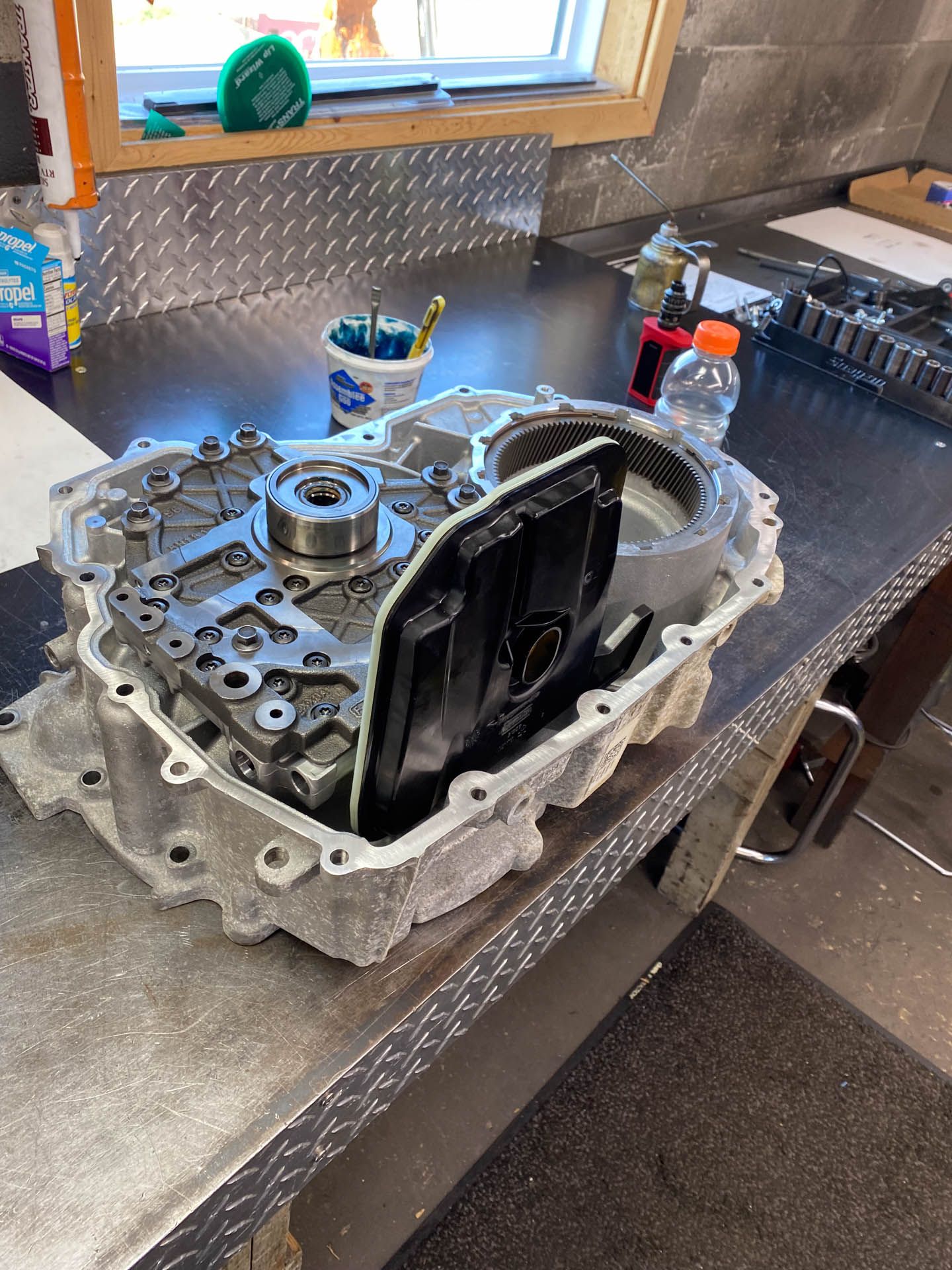 A piece of metal is sitting on top of a counter.