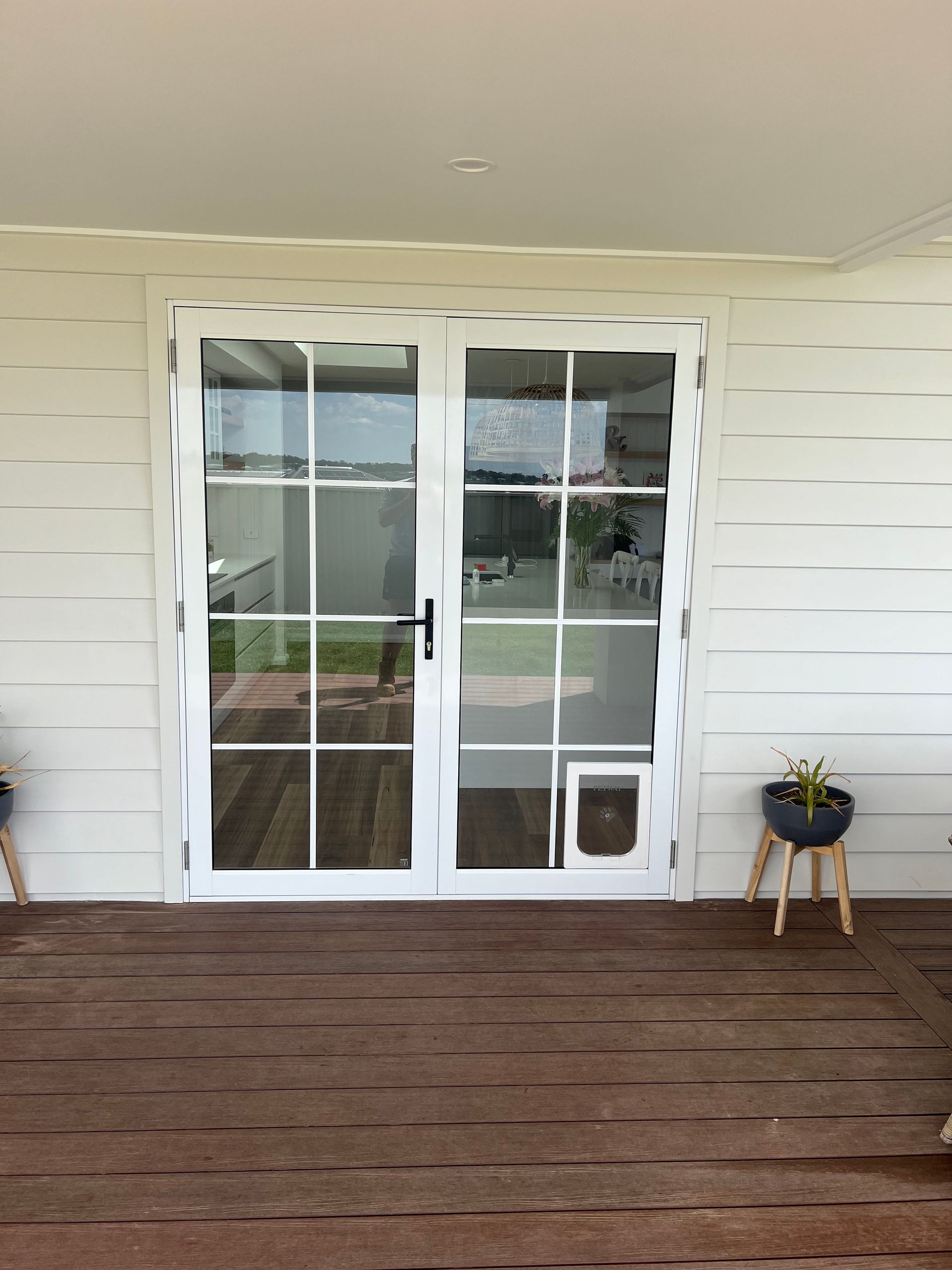 Room With A Large Glass Door In The Center — SG Glass & Aluminium in Wagga Wagga, NSW