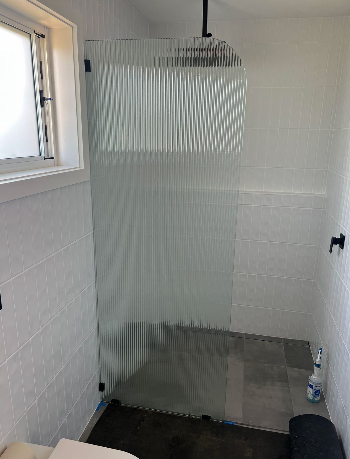 Bathroom Featuring A Shower Stall And A Toilet — SG Glass & Aluminium in Wagga Wagga, NSW