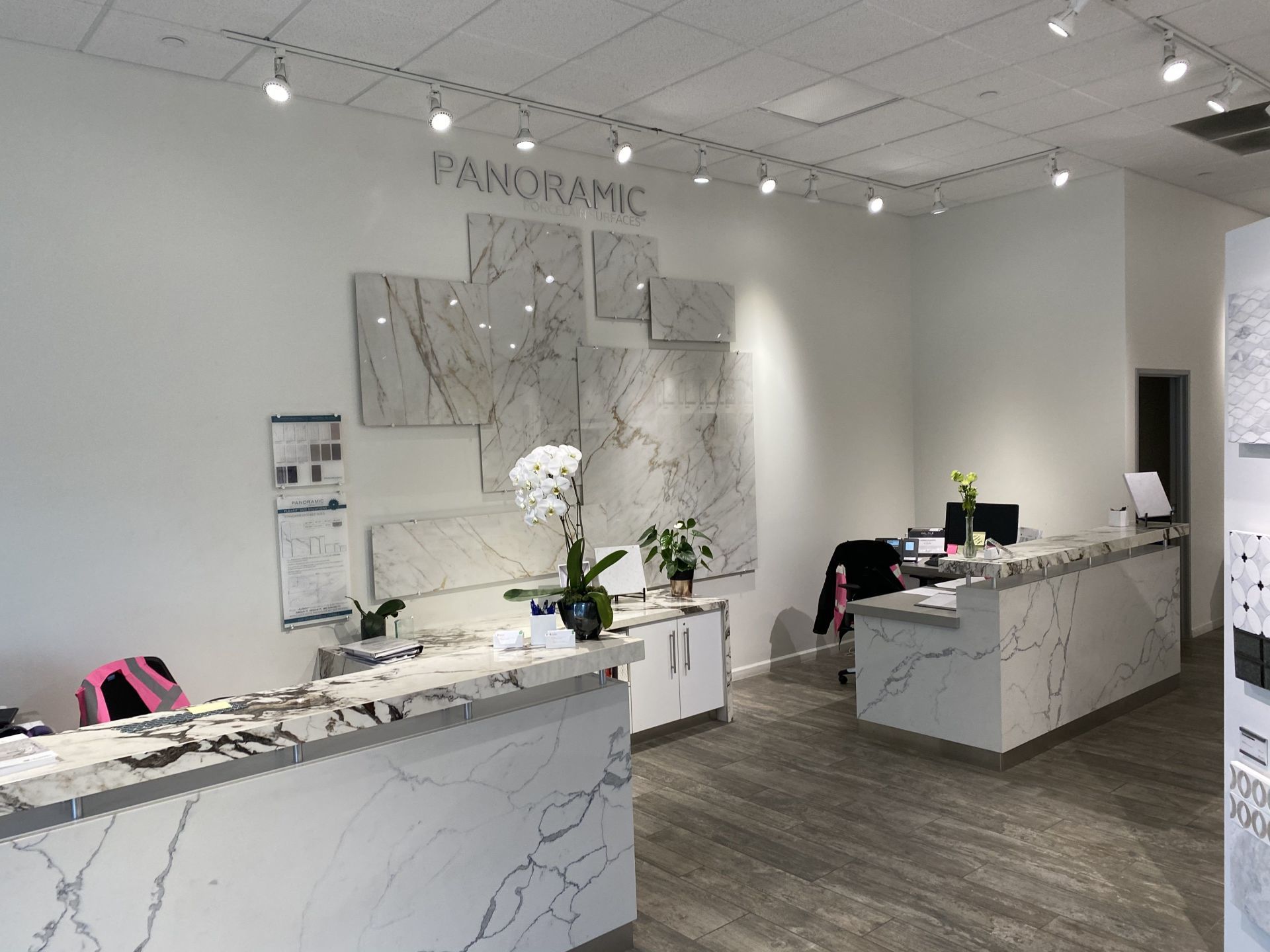 A large room with a marble counter top and a sign that says panorama