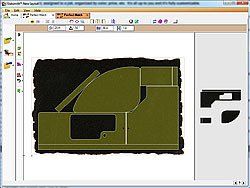 A computer screen shows a drawing of a military vehicle.