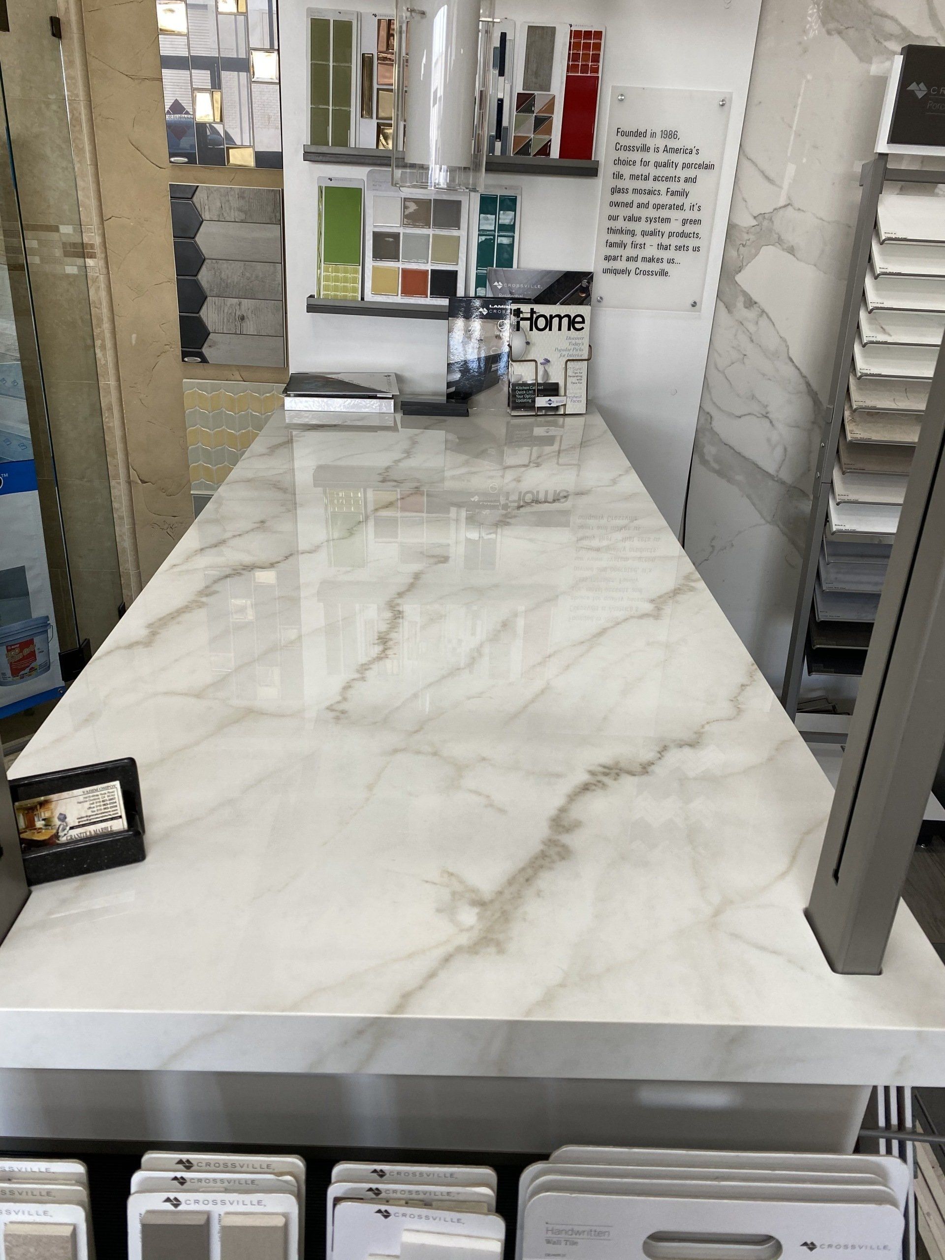 A counter in a store with a marble counter top