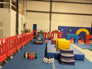 Indoor Playground With a Bunch of Toys