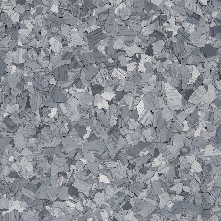 Gray and white speckled abstract texture with small stone-like fragments