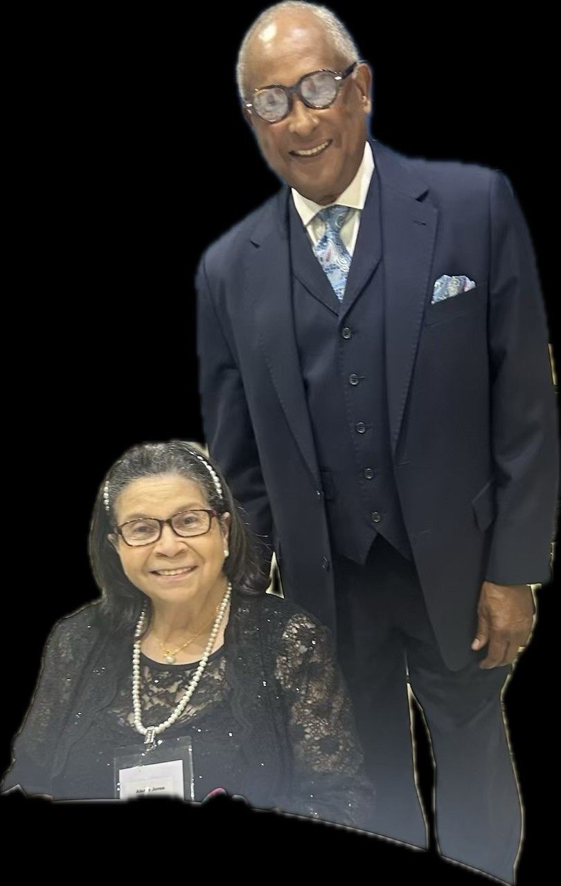 A man and a woman are posing for a picture together