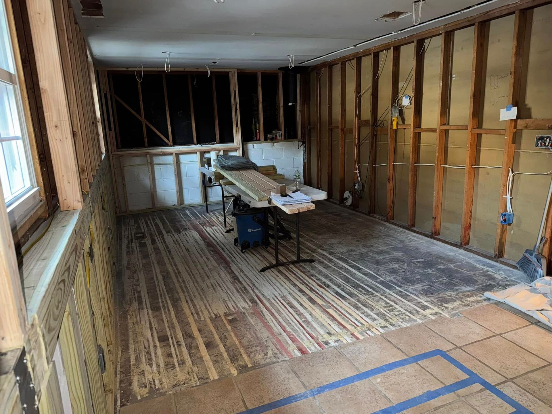 There is a table in the middle of the room.