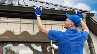 Roof Installation — Man Installing House Roof Rain in Citrus County, FL