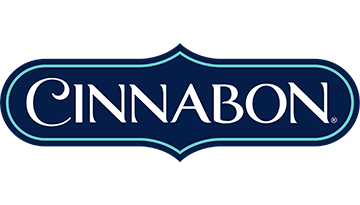 Cinnabon logo within a navy blue and teal frame. White text on a dark blue background.