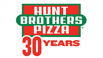 Hunt Brothers Pizza logo celebrating 30 years. Green and red rectangle with white text.