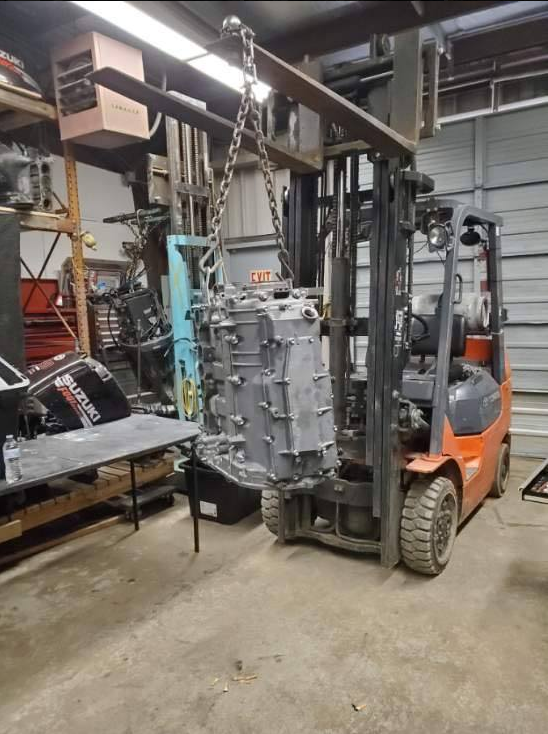 Boat Engine on Fork Lift Inside Warehouse — Chesapeake, VA — Lancet Marine