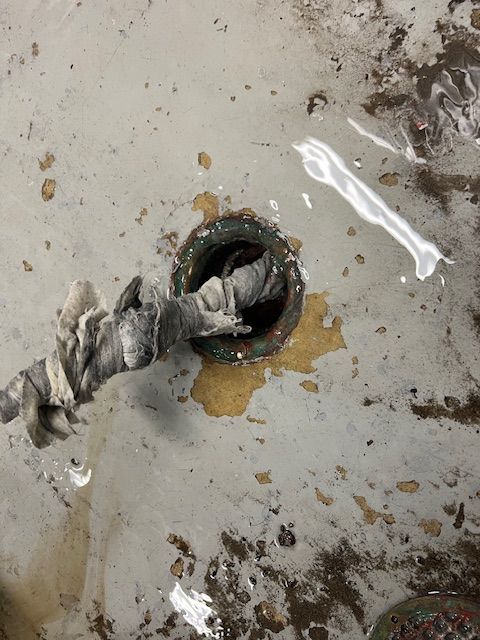 A close up of a sink with a hole in it