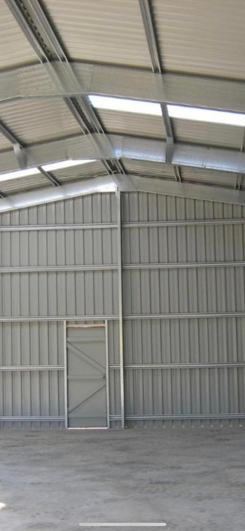 Door In The Middle Of The Building — Providing Steel & Concrete Construction In Eviron, NSW