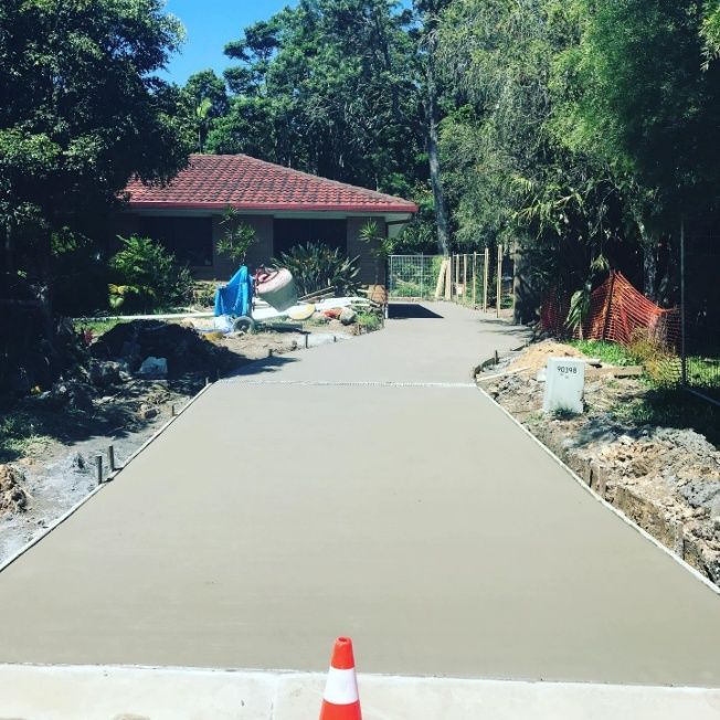 Concrete Driveway Is Being Built In Front Of A House — Providing Steel & Concrete Construction In Eviron, NSW