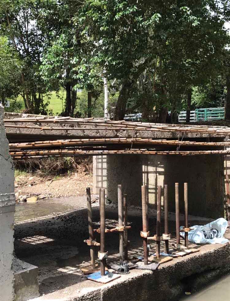 Bridge Is Being Built Over A Body Of Water — Providing Steel & Concrete Construction In Eviron, NSW