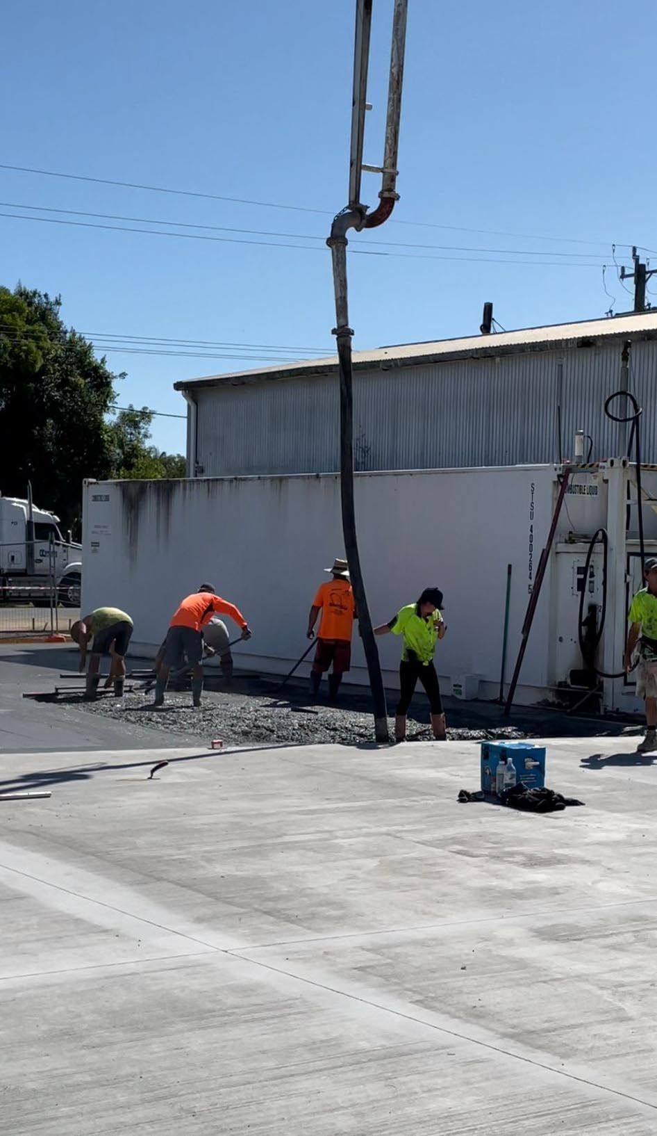 Group Of Construction Workers Are Working On A Concrete Floor — Providing Steel & Concrete Construction In Eviron, NSW