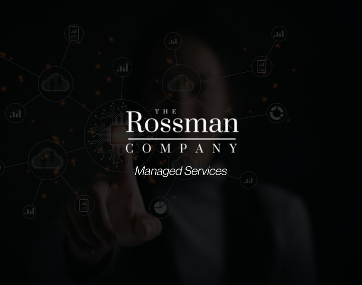 A man in a suit is pressing a button on a screen.