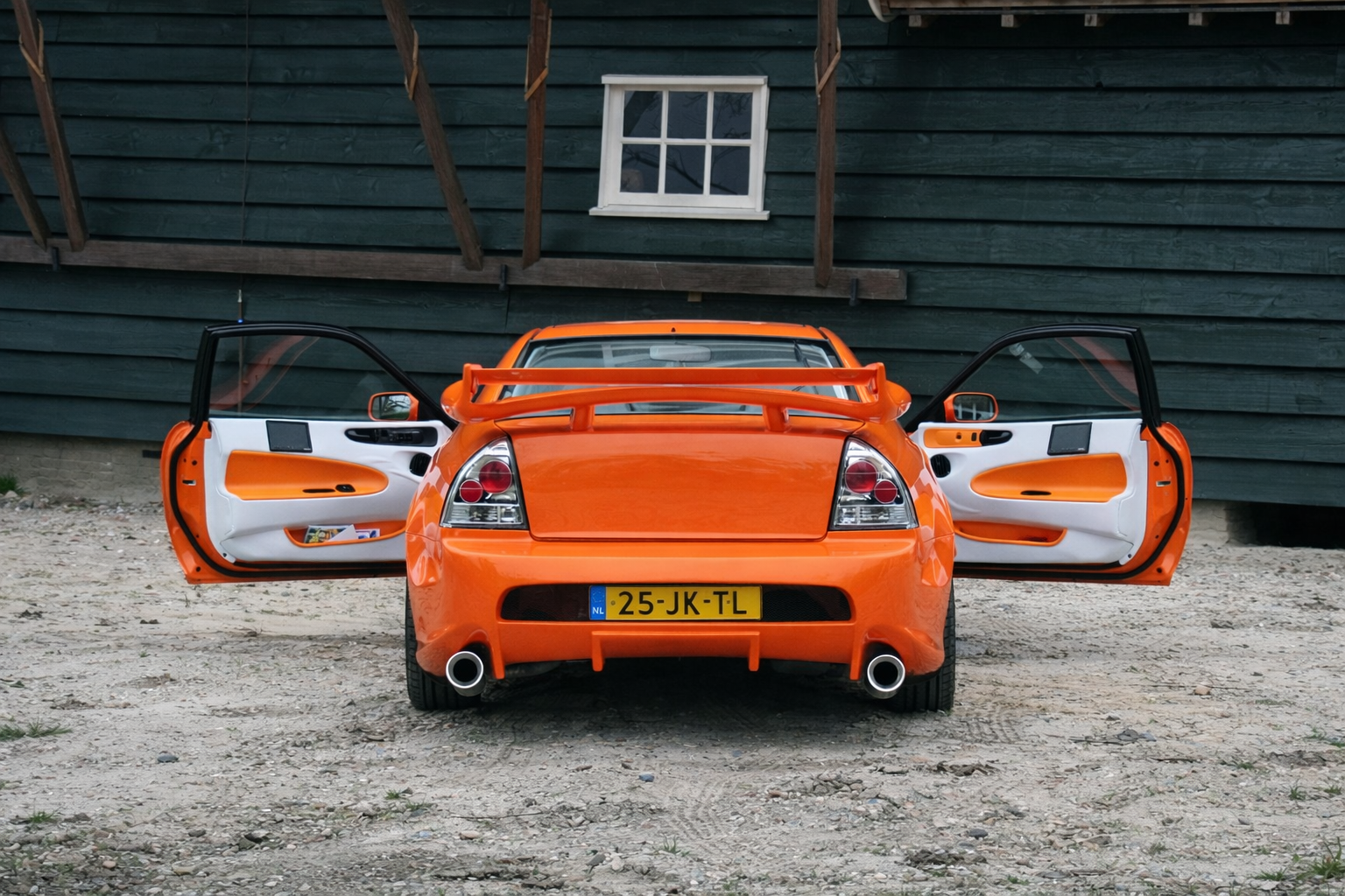 Zeilmakerij Road&River zeilmakerij stoffeerderij honda Prelude oranje 