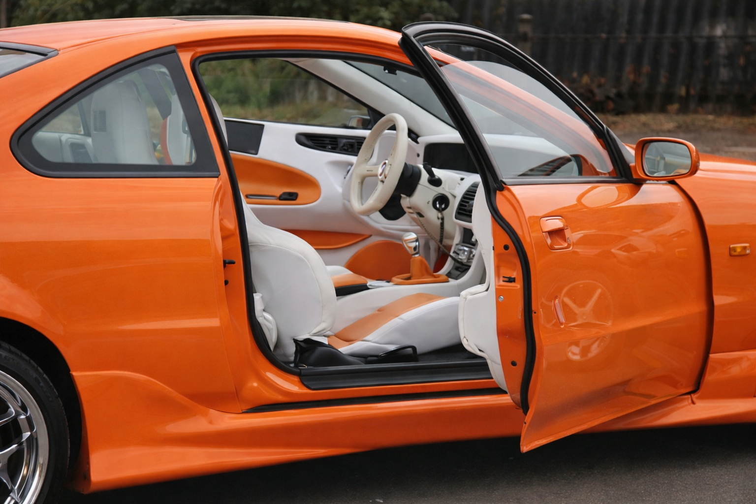 Zeilmakerij Road&River zeilmakerij stoffeerderij honda Prelude oranje 