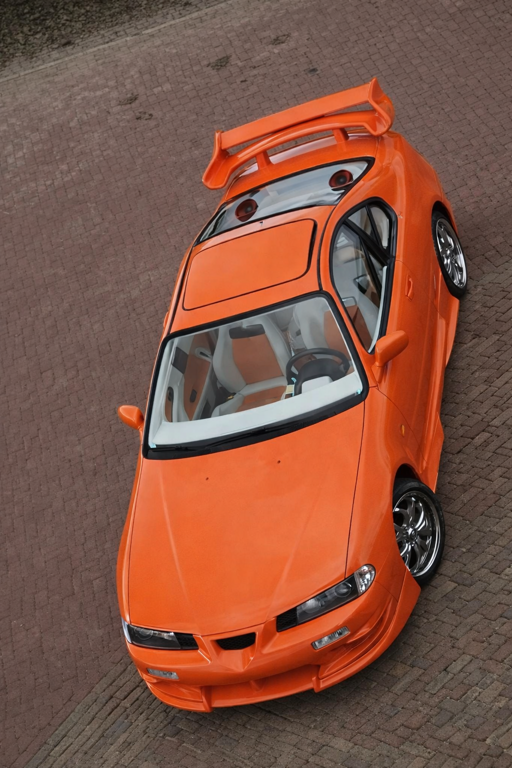 Zeilmakerij Road&River zeilmakerij stoffeerderij honda Prelude oranje 