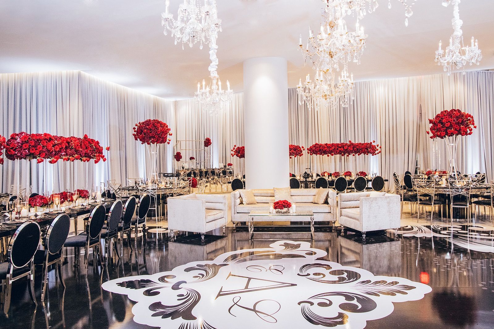 a large room with tables and chairs and a dance floor .
