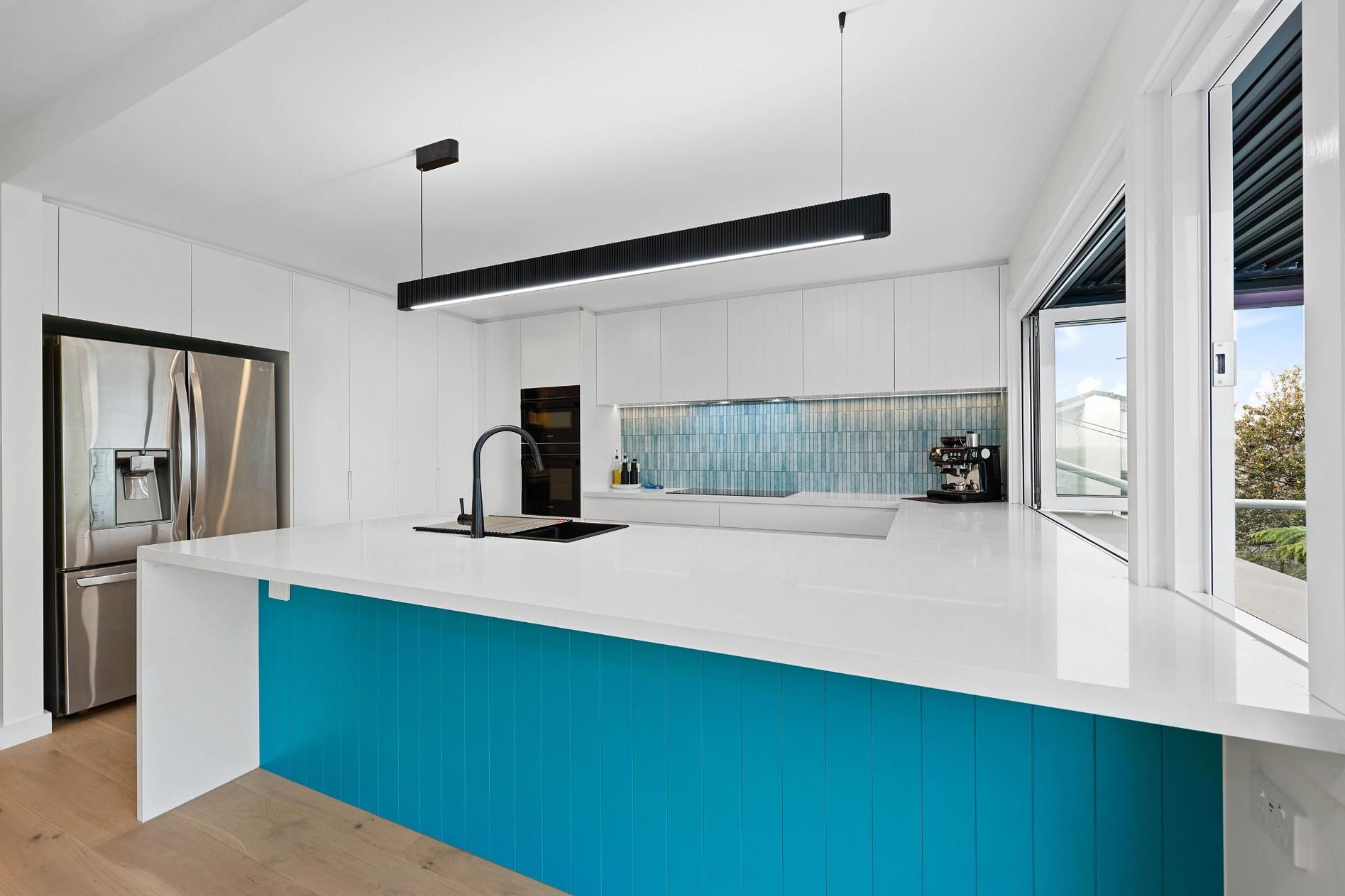 Modern Kitchen with White Cabinets, Blue Island, and A Large Window — Above & Beyond Interiors Custom Joinery in North Curl Curl, NSW