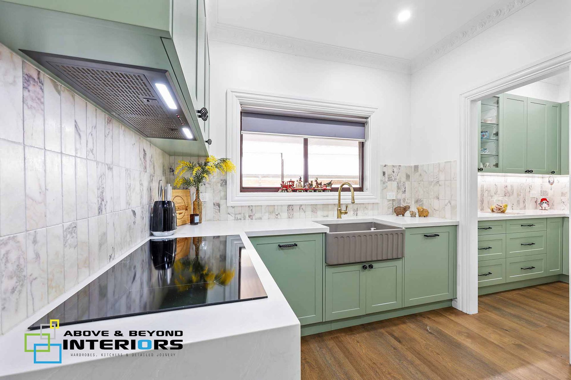 Bright Modern Kitchen with Mint Cabinets — Above & Beyond Interiors in Smeaton Grange, NSW