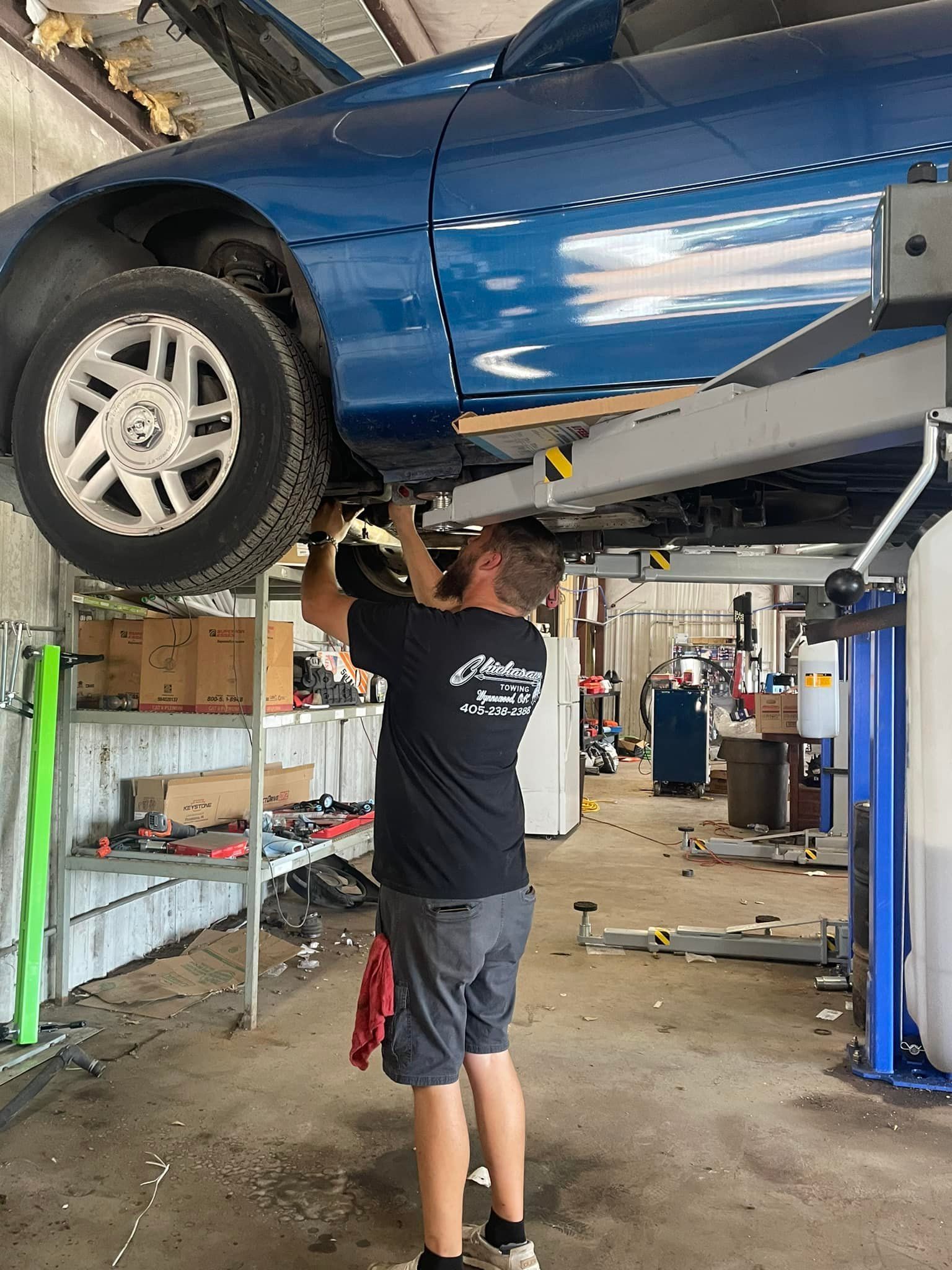 Car Being Lifted on a Vehicle Hoist | Pauls Valley Automotive